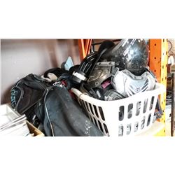 BASKET OF HELMETS, SPORTS PADS, BOOTS, AND GOLF CLUBS