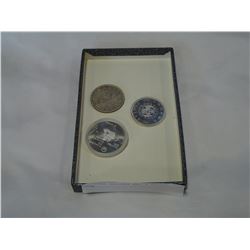 2 SILVER DOLLARS AND 5 DOLLAR COIN