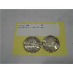 TWO 1963 SILVER DOLLARS