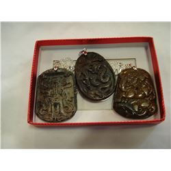 3 CARVED JADE PENDANTS