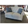 Image 1 : NEW ASHLEY BEIGE TUFTED FABRIC LOVESEAT WITH NAILHEAD ACCENTS, RETAIL $1699