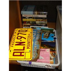 TRAY OF POST CARDS AND BOOKS AND VINTAGE LICENSE PLATES