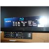 Image 2 : BOX OF DVDS AND BLURAY PLAYER