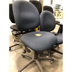 3 - Blue pattern office chairs with adjustable height. 1 chair has no arm rest