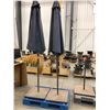 Qty 2 umbrellas with 2 solid steel stand, material sun faded, stand faded spots of rust