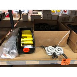 Qty 4 1/2" eye bolts, cold shrink, qty 8 semi-conducting tape, 3 boxes of assorted cable clamps