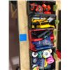 Image 1 : Assorted electrical tape, punches, utility knives, tape measures, cable strippers
