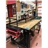 Image 2 : Heavy duty custom rolling work bench 72" x 36" x 73" powder coat black paint, wired with receptacles