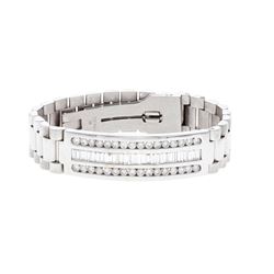 BRACELET: [1] 14kt white gold diamond bracelet; Italian president style bracelet set with (32) round
