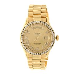 WATCH: [1] 18kt yellow gold Rolex Oyster Perpetual Day-Date wristwatch; Aftermarket champagne dial w