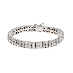 BRACELET:  [1] 14 karat white gold bracelet set with 104 round brilliant cut diamonds, approx. 25.00