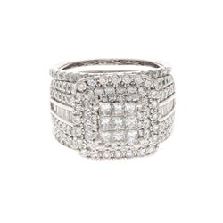 RING: 14k white gold ring, size 8.5; (9) princess cut diamonds, 2.2mm-2.3mm = an estimated 0.60 tota