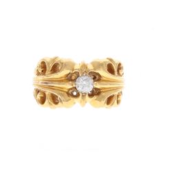 RING: [1] 22kt yellow gold "Chrome Hearts" keeper ring set with (1) round brilliant diamond, estimat