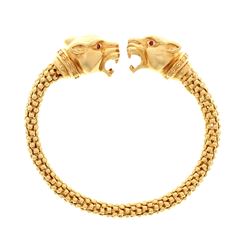 BRACELET: [1] 14ky stamped panther bracelet; (4) rb synthetic ruby, 1.8mm; few spots on bracelet sho