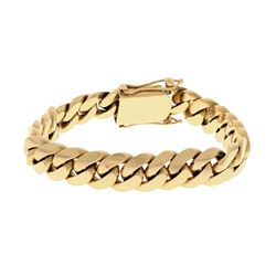 BRACELET: [1] 14ky stamped bracelet, 9 inches long, 13.36mm wide; 113.3 grams.