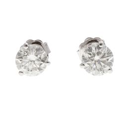 EARRINGS: [1] 14kw pair of tested earrings with sterling silver earring backs; (1) rb diamond, 7.29m