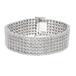 BRACELET: [1] 14k white gold bracelet 8.50 inches long with (312) round brilliant cut diamonds 2.3mm