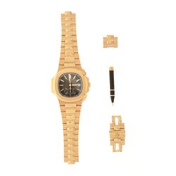 WATCH: [1] 18k rose gold Patek Philippe Nautilus watch, 40.5mm case, grey dial with 2 sub dials, dat