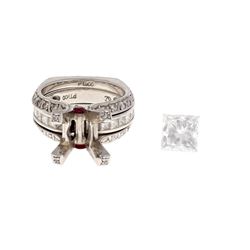 RING: Platinum ring, size 4; (1) princess cut diamond, 6.81mm x 6.80mm x 4.90mm = an estimated 1.88