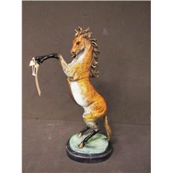 SCULPTURE: Painted bronze rearing horse, signed Marius in the mold; on verdigris and marble base. 26
