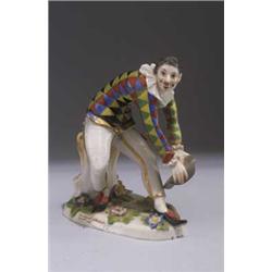 DEUTSCHLAND - Harlekin, - Porzellan. Harlekin aus der comedia del arte. Farbige Bemalung. Auf B...