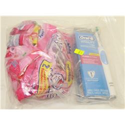 BAG WITH ASSORTED CANDY AND ORAL B ELECTRIC