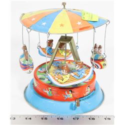 TIN MECHANICAL CAROUSEL.