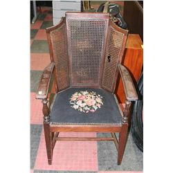 VINTAGE WOOD AND WICKER NEEDLEPOINT CHAIR AS IS