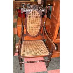 WICKER AND WOOD CARVED ARMCHAIR
