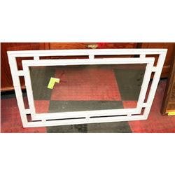 MIRROR WITH WHITE FRAME.