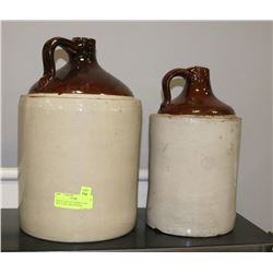 PAIR OF ANTIQUE WHISKY JUGS INCL LARGE AND MEDIUM