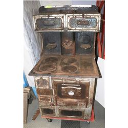 1893 MONARCH COOK STOVE 33"X27"X62.