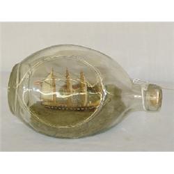 SHIP MODEL W/ VILLAGE IN A PINCHED BOTTLE