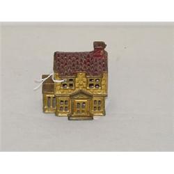 3" PAINTED CAST IRON BUILDING STILL BANK - GOLD HOUSE W/ RED ROOF