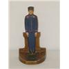 Image 1 : 9" PAINTED CAST IRON DOORSTOP - BELL HOP IN A BLUE UNIFORM