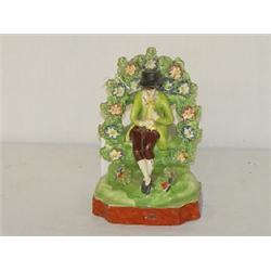 EARLY STAFFORDSHIRE FIGURINE OF A MAN W/ A HORN