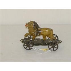 PAINTED TIN LION PULL TOY BY GEORGE BROWN CIRCA 1870