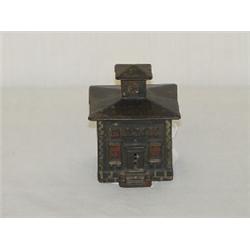 3 1/4" PAINTED CAST IRON BANK BUILDING STILL BANK - BLACK W/ RED LETTERING