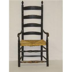 EARLY LADDERBACK ARMCHAIR W/ SCROLL ARMS & BLACK PAINT