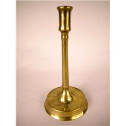 A BRASS CANDLESTICK, FLEMISH