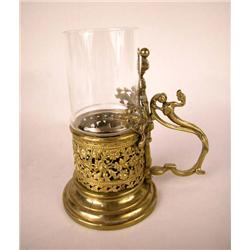 A BRASS CHAMBERSTICK, FRENCH WITH GLASS GLOBE
