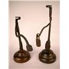 Image 1 : A GROUP OF TWO WEIGHTED RUSH LIGHTS ON WOOD STANDS, CONTINENTAL