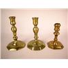 Image 1 : A GROUP OF THREE BRASS CANDLESTICKS, ENGLISH
