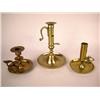 Image 1 : A GROUP OF THREE BRASS CHAMBERSTICKS ENGLISH AND CONTINENTAL