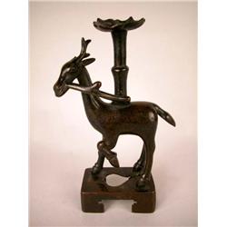 A CAST BRONZE CANDLESTICK, CONTINENTAL