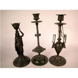 A GROUP OF THREE IRON CANDLESTICKS, GERMAN
