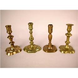 A GROUP OF FOUR CANDLESTICKS, ENGLISH