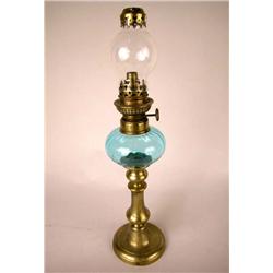 A BRASS OIL LAMP WITH BLUE GLASS, CONTINENTAL