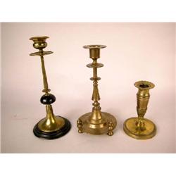 A GROUP OF THREE BRASS CANDLESTICKS, CONTINENTAL