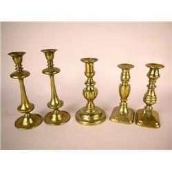 A GROUP OF FIVE BRASS CANDLESTICKS, ENGLISH